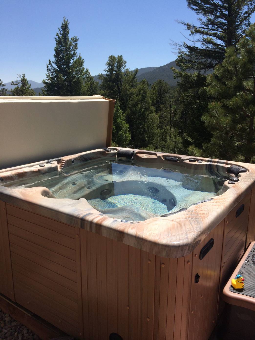 Photos of Very Happy Wind River Spas Customers And Their Hot Tubs